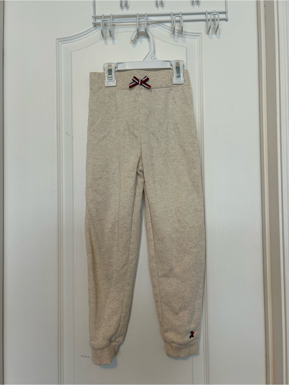 Tommy Hilfiger Beige Kids Sweatpants with Red-Trim Bow